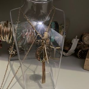 Long gold chain with charms